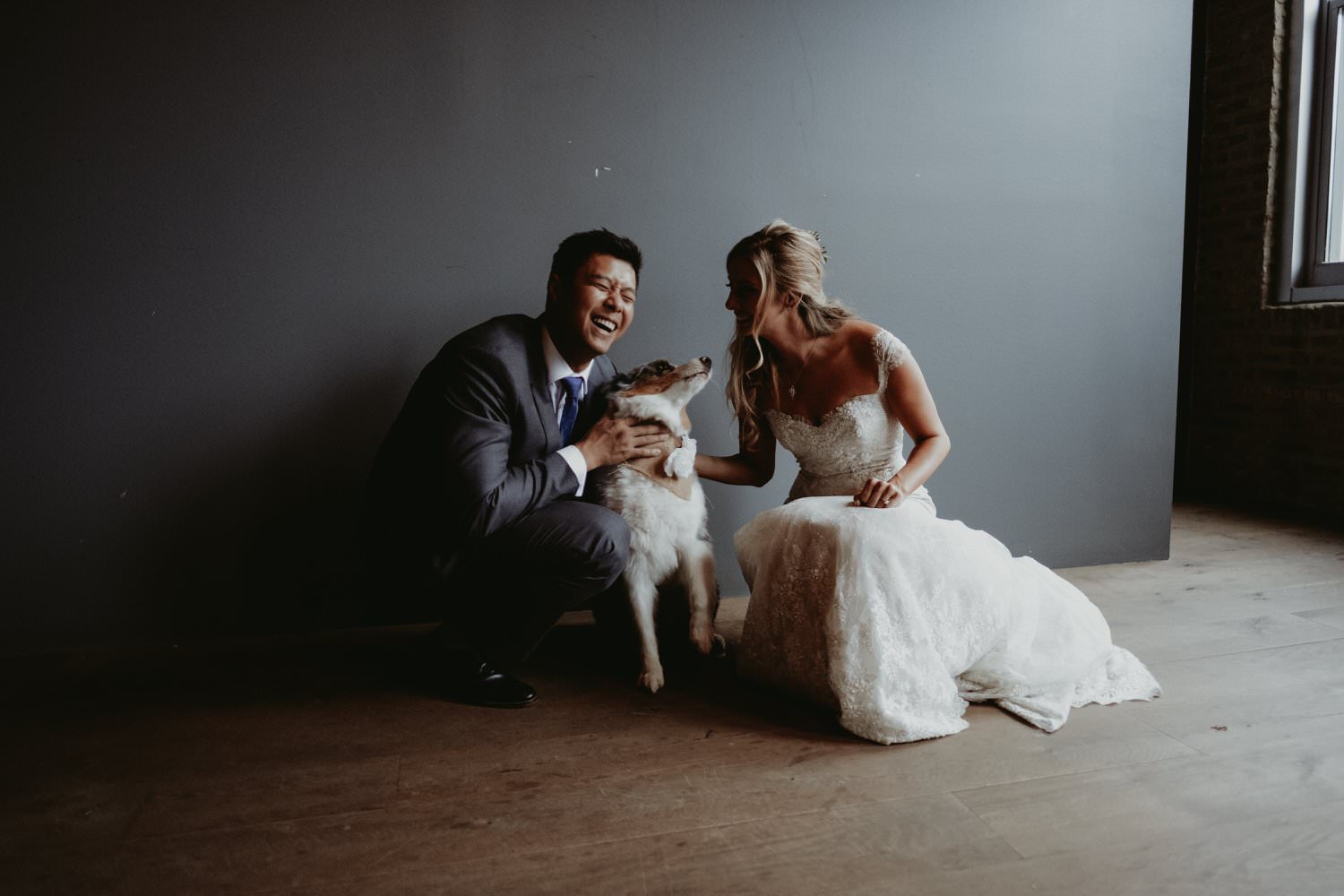 architectural artifacts Chicago wedding photography. Bride and groom with cute dog.
