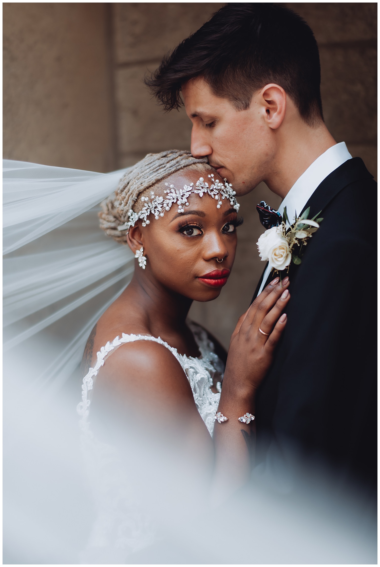 Keith House Chicago Wedding, The Adamkovi, romantic veil photo of the bride and groom, interracial couple