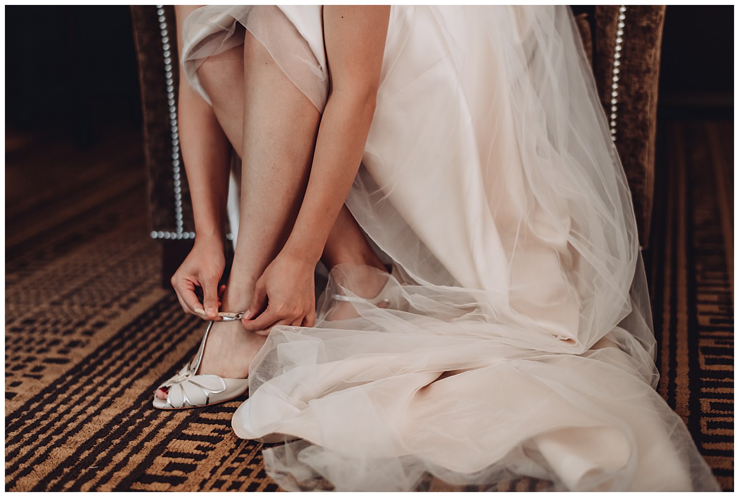 The carleton of Oak Park Wedding getting ready, bride putting shoes on
