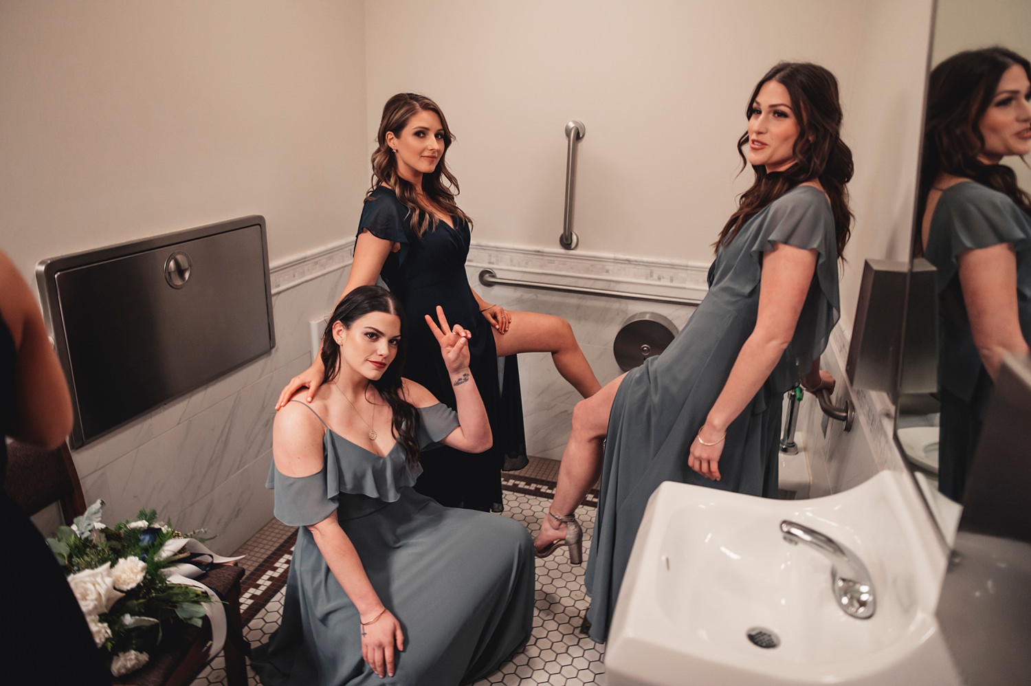 Salvatore's Chicago Wedding - St. Josaphat Catholic Church, bride and bridesmaids getting ready in a bathroom