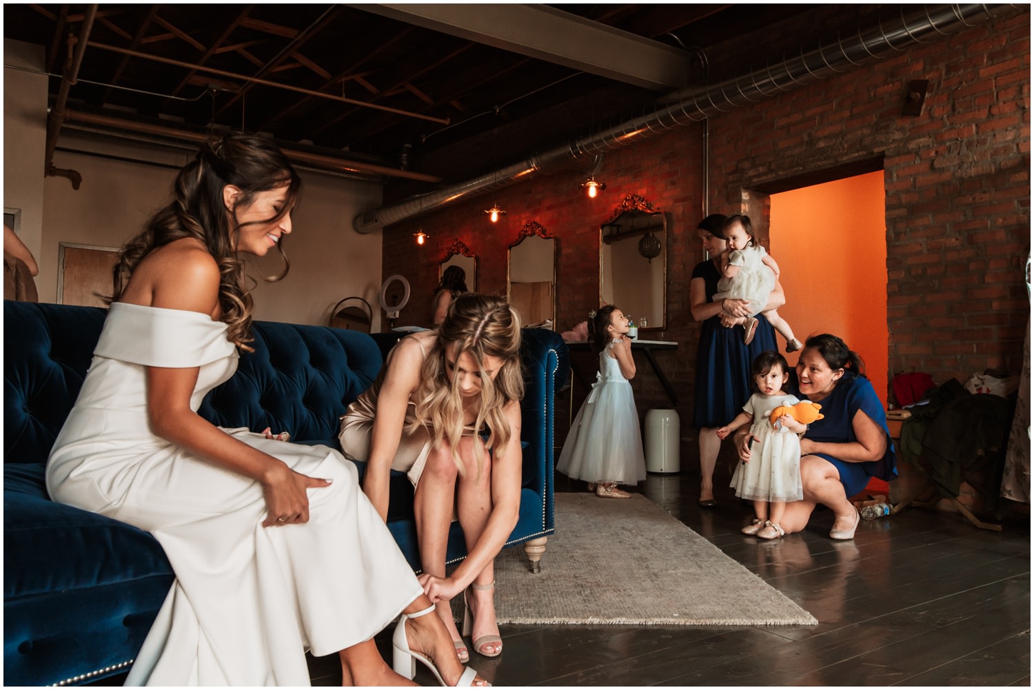 Fairlie Chicago Wedding getting ready bridesmaids helping bride to get ready. documentary photo