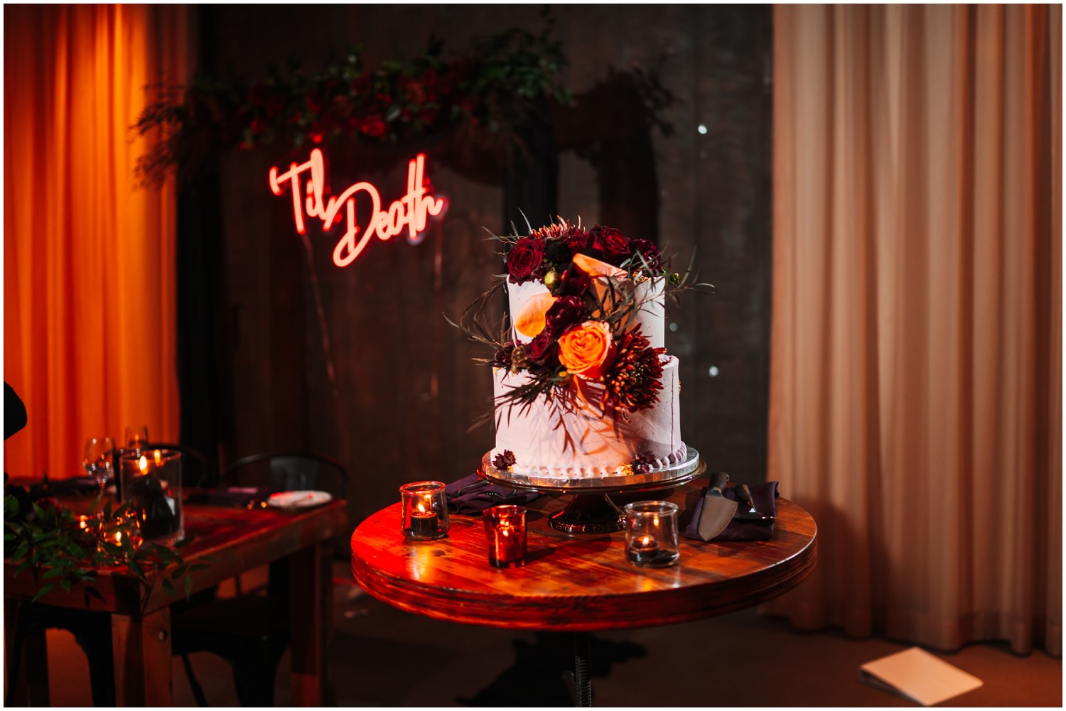 Ovation Chicago Wedding Photos - dark reception decor black/burgundy cake and till death neon sign
