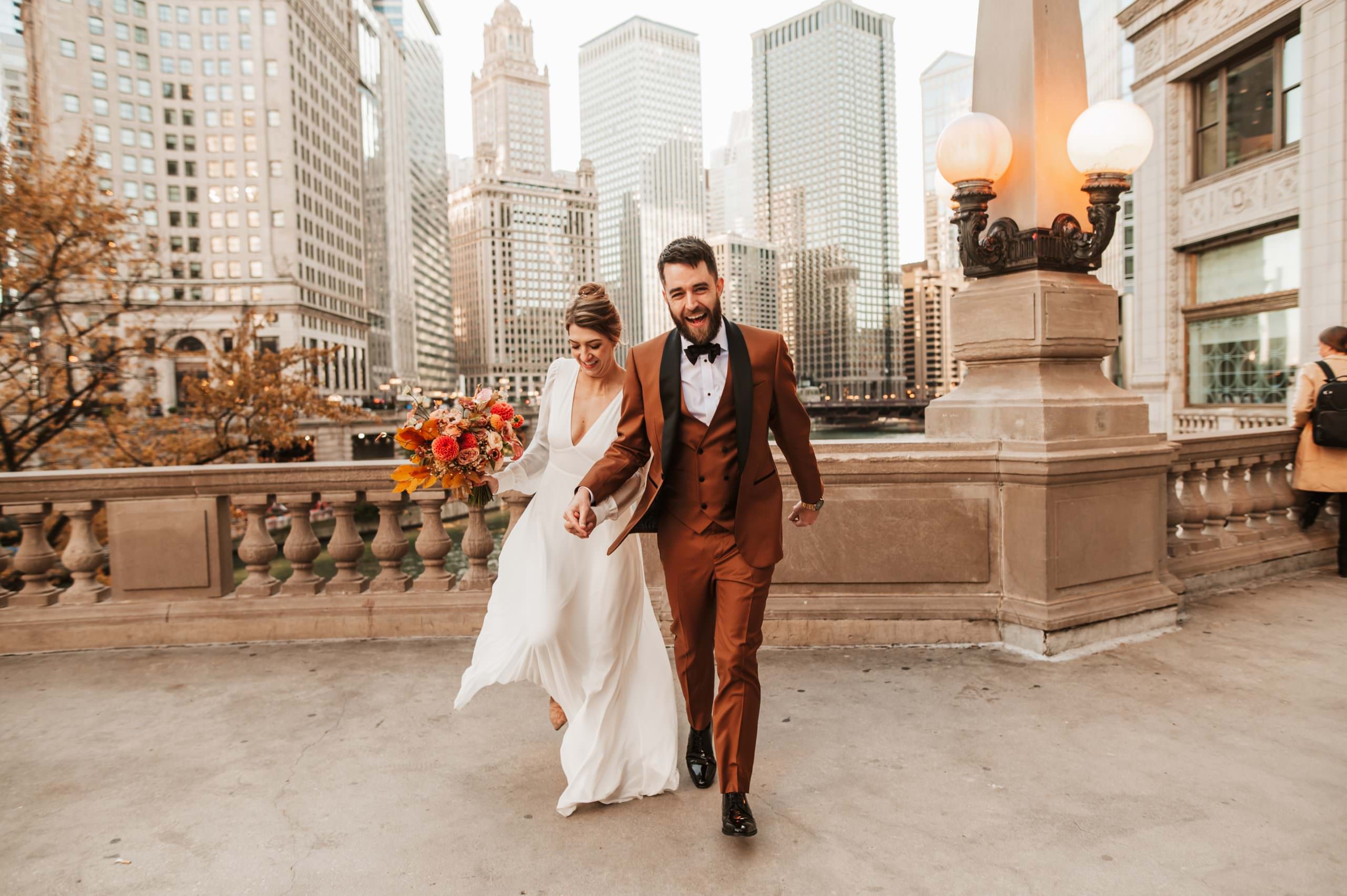 Chicago wedding couple at the Wrigley Building high energy documentary photo